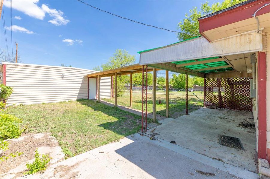 Exterior details and patio area of a home in , Brownwood (Image 14).