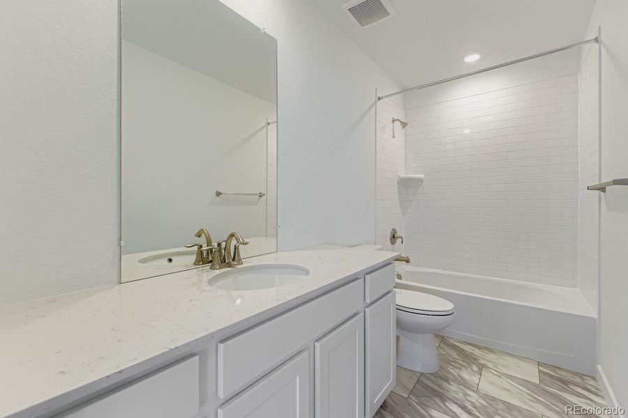 Furnished interior view inside a new home in Vermilion Creek: The Pioneer Collection, Centennial (Image 5).