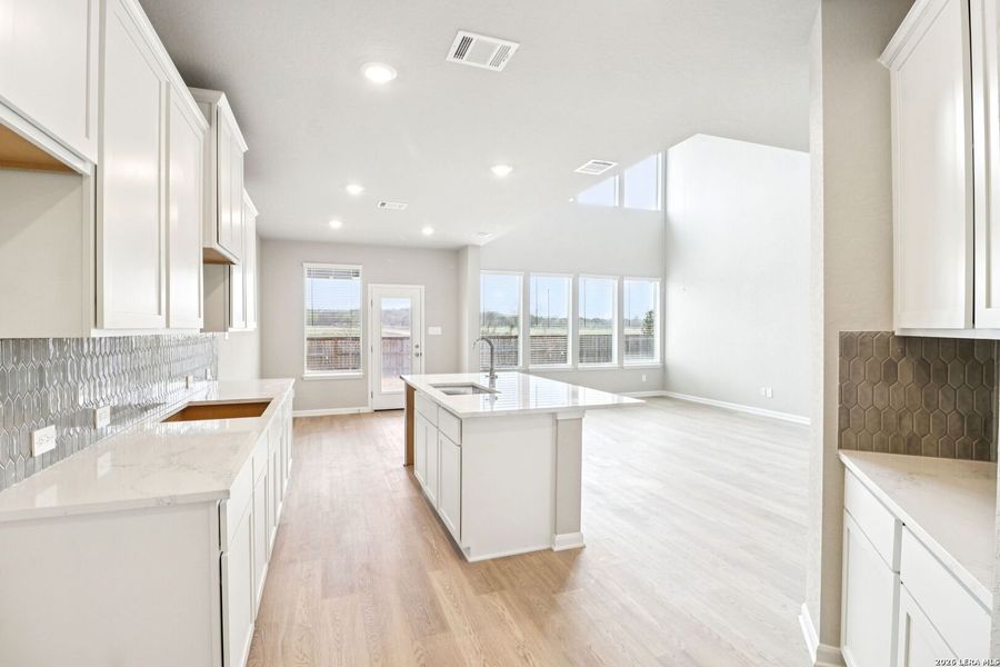 Furnished interior view inside a new home in Estancia Ranch - Classic Series, San Antonio (Image 13).
