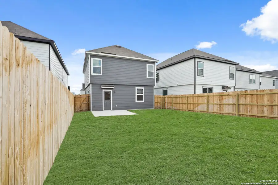 Exterior details and patio area of a home in Melissa Ranch, San Antonio (Image 3). Exterior details and patio area of a home in Melissa Ranch, San Antonio (Image 3).