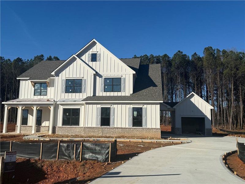 Front exterior of a new home in The Reserve at Knollwood, Canton, GA, highlighting curb appeal (Image 30).