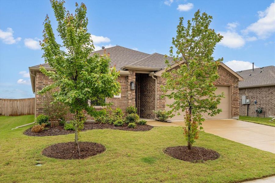 Front exterior of a new home in Fox Landing, Caddo Mills, TX, highlighting curb appeal (Image 24).