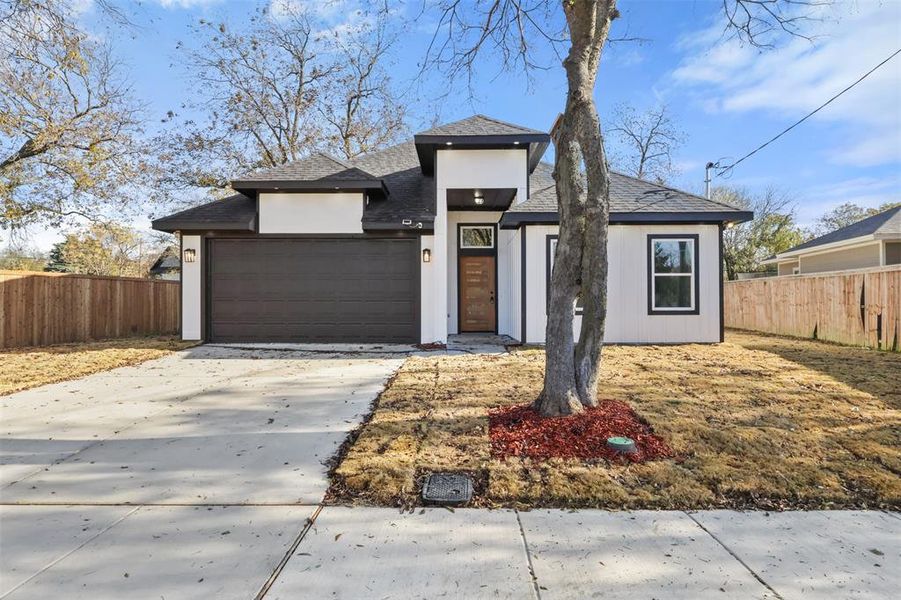 View of front of house with a garage