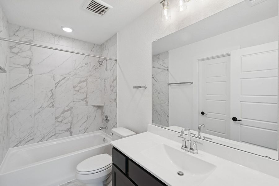 Furnished interior view inside a new home in Sorella, Tomball (Image 3).