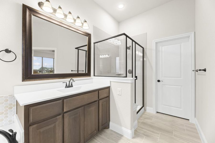 Primary Bathroom | Concept 2370 at Villages of Walnut Grove in Midlothian, TX by Landsea Homes