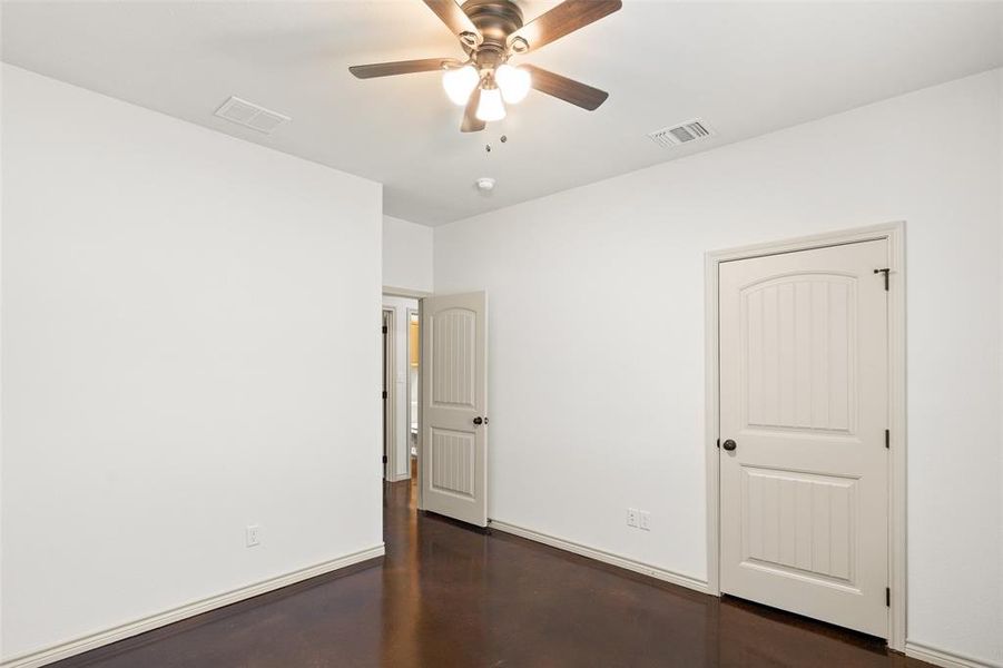 Guest bedroom with ceiling fan