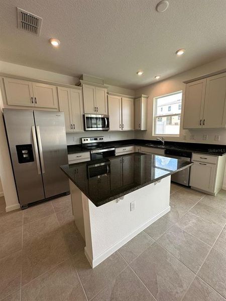 Furnished interior view inside a new home in , Kissimmee (Image 3).