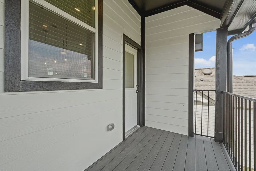 Exterior details and patio area of a home in Bridgeland Chateaus, Cypress (Image 4).