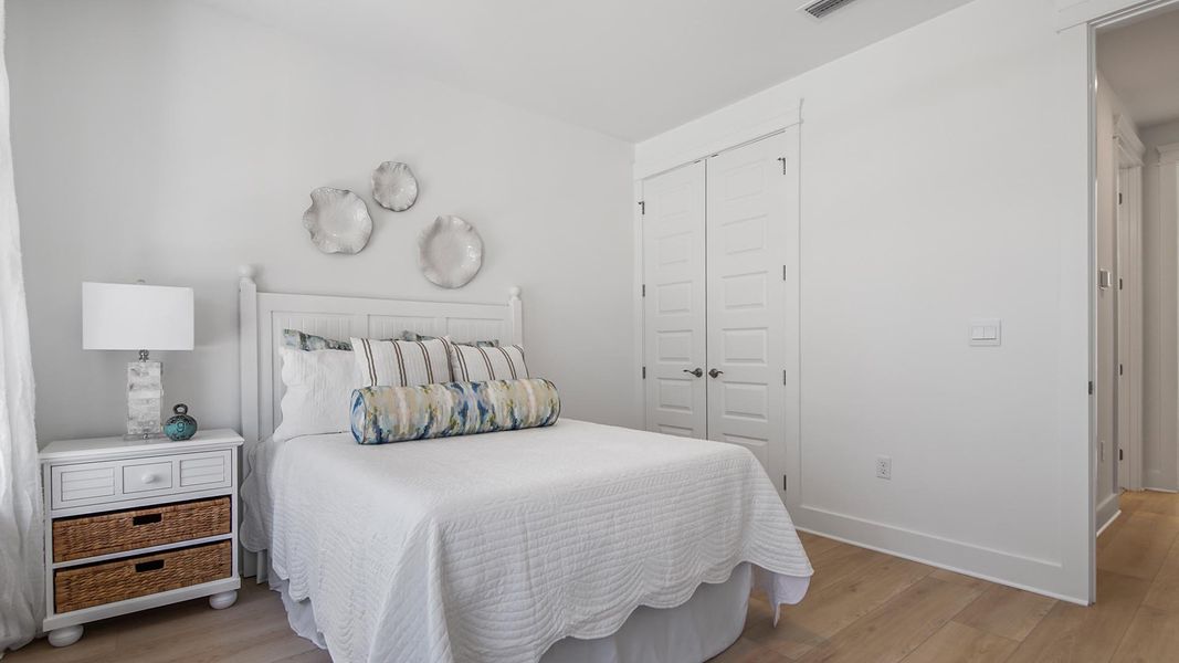 Representative furnished interior of a home built from the Jubilee by D.R. Horton in Breakfast Point East Phase II, Panama City Beach (Image 31).