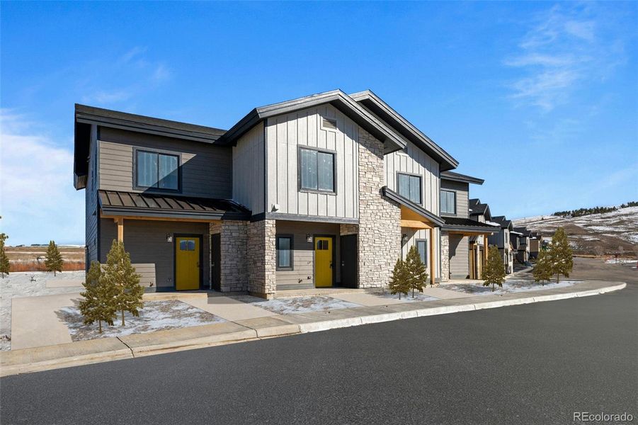 Front exterior of a new home in , Granby, CO, highlighting curb appeal (Image 25). Front exterior of a new home in , Granby, CO, highlighting curb appeal (Image 25).