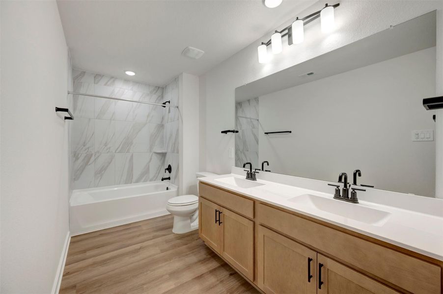 Furnished interior view inside a new home in Sorella, Tomball (Image 6).