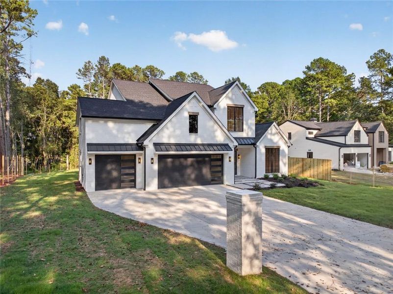 Front exterior of a new home in , Loganville, GA, highlighting curb appeal (Image 28). Front exterior of a new home in , Loganville, GA, highlighting curb appeal (Image 28).