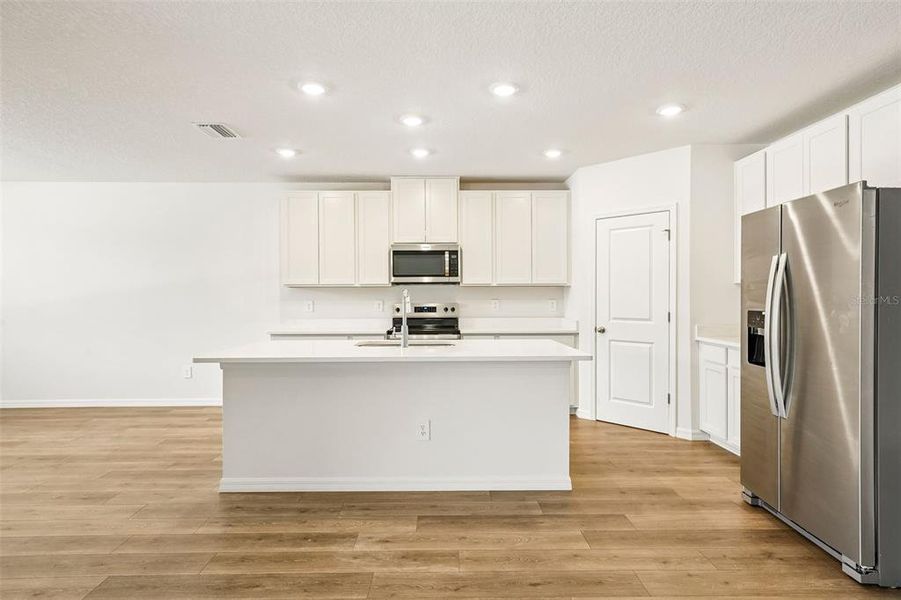 Furnished interior view inside a new home in Pine Ridge Meadows, Hudson (Image 5).