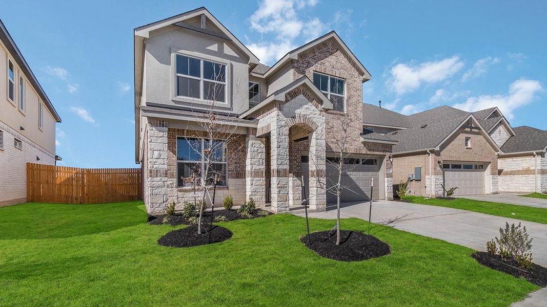 Representative exterior photo of a completed home built from the The Lincoln II by D.R. Horton in Rosenbusch Ranch, Leander, TX (Image 19).