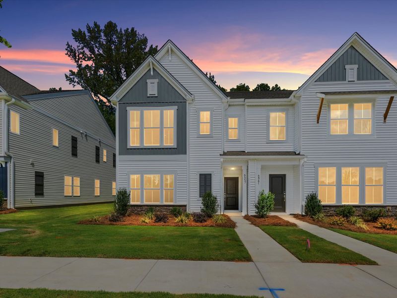 Front exterior of a new home in Westwood Reserve, Charlotte, NC, highlighting curb appeal (Image 1). Front exterior of a new home in Westwood Reserve, Charlotte, NC, highlighting curb appeal (Image 1).