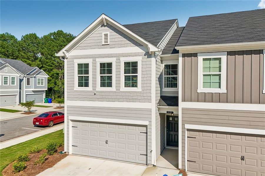 Front exterior of a new home in , Decatur, GA, highlighting curb appeal (Image 23).