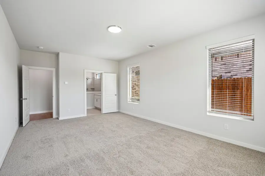 Primary Bedroom in the Wimbledon home plan by Trophy Signature Homes