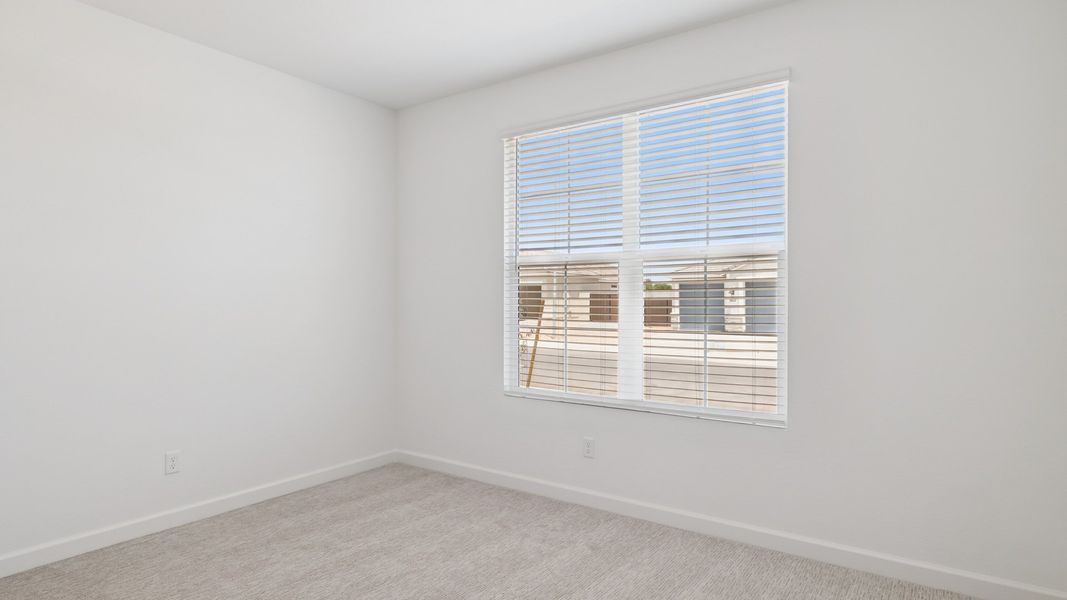 Spacious, unfurnished interior of a new home in Zanjero Pass, Waddell (Image 23).