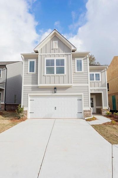 Front exterior of a new home in , Buford, GA, highlighting curb appeal (Image 18).
