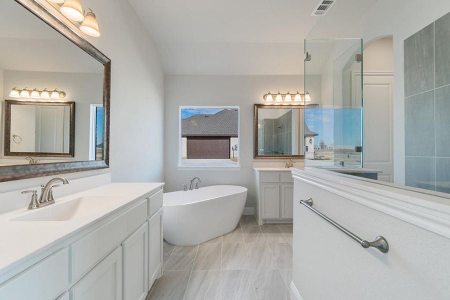 Primary Bathroom | Concept 2406 at The Meadows in Gunter, TX by Landsea Homes