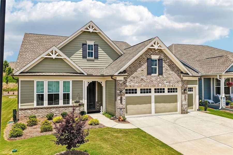 Front exterior of a new home in , Hoschton, GA, highlighting curb appeal (Image 25). Front exterior of a new home in , Hoschton, GA, highlighting curb appeal (Image 25).
