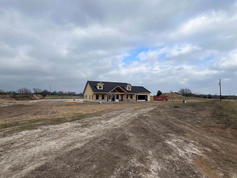 Custom home in early construction on over 3 acres.