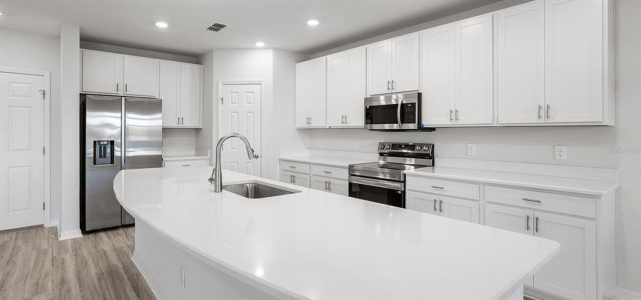 Furnished interior view inside a new home in The Crossings - Single-Family Homes, St. Cloud (Image 4). Furnished interior view inside a new home in The Crossings - Single-Family Homes, St. Cloud (Image 4).