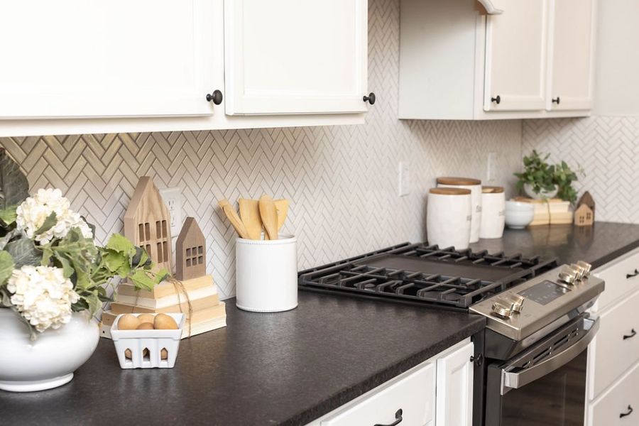 Representative furnished interior of a home built from the The Laurel by Avonley Homes in Greens Prairie Reserve, College Station (Image 29).