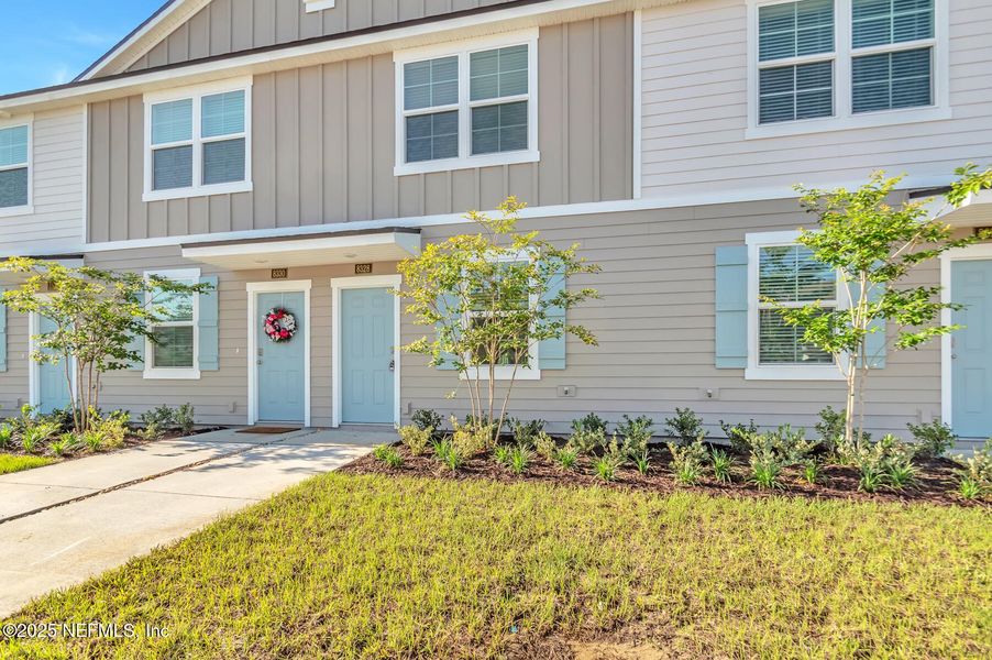 Front exterior of a new home in , Jacksonville, FL, highlighting curb appeal (Image 21). Front exterior of a new home in , Jacksonville, FL, highlighting curb appeal (Image 21).