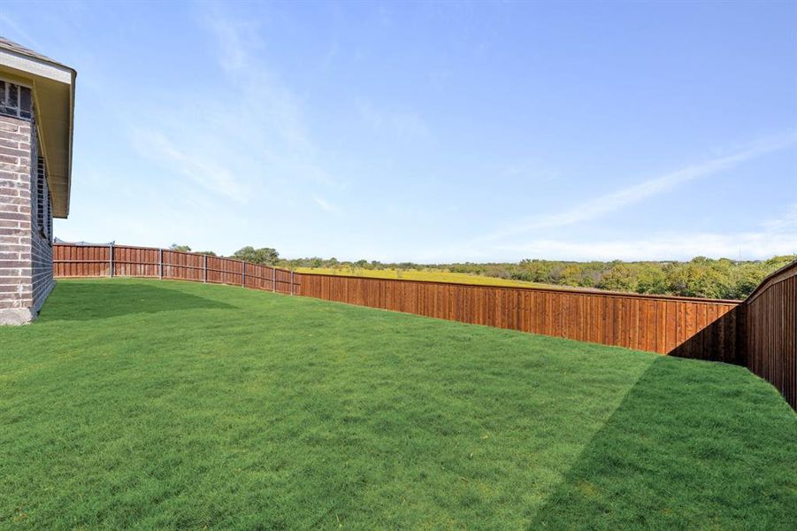 Exterior details and patio area of a home in Wildcat Ridge Phase 3, Godley (Image 24). Exterior details and patio area of a home in Wildcat Ridge Phase 3, Godley (Image 24).