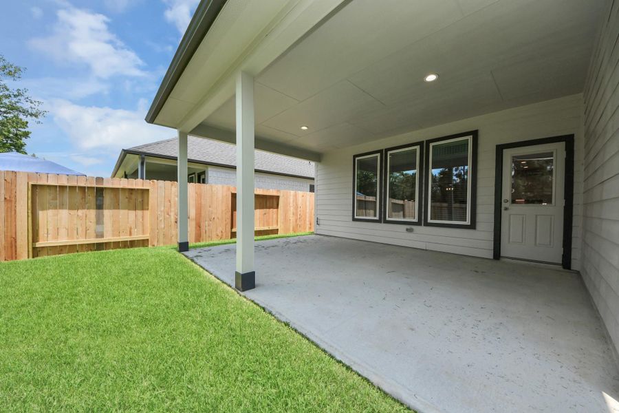 Come and see this spacious backyard with its beautiful covered patio. There is plenty of room for the kids to play and adults to relax. Perfect for your outdoor living space, patio furniture, bbq pit, and so much more. The possibilities are endless! Sample photo of completed home with similar floor plan. Actual colors and selections may vary. Come and see this spacious backyard with its beautiful covered patio. There is plenty of room for the kids to play and adults to relax. Perfect for your outdoor living space, patio furniture, bbq pit, and so much more. The possibilities are endless! Sample photo of completed home with similar floor plan. Actual colors and selections may vary.
