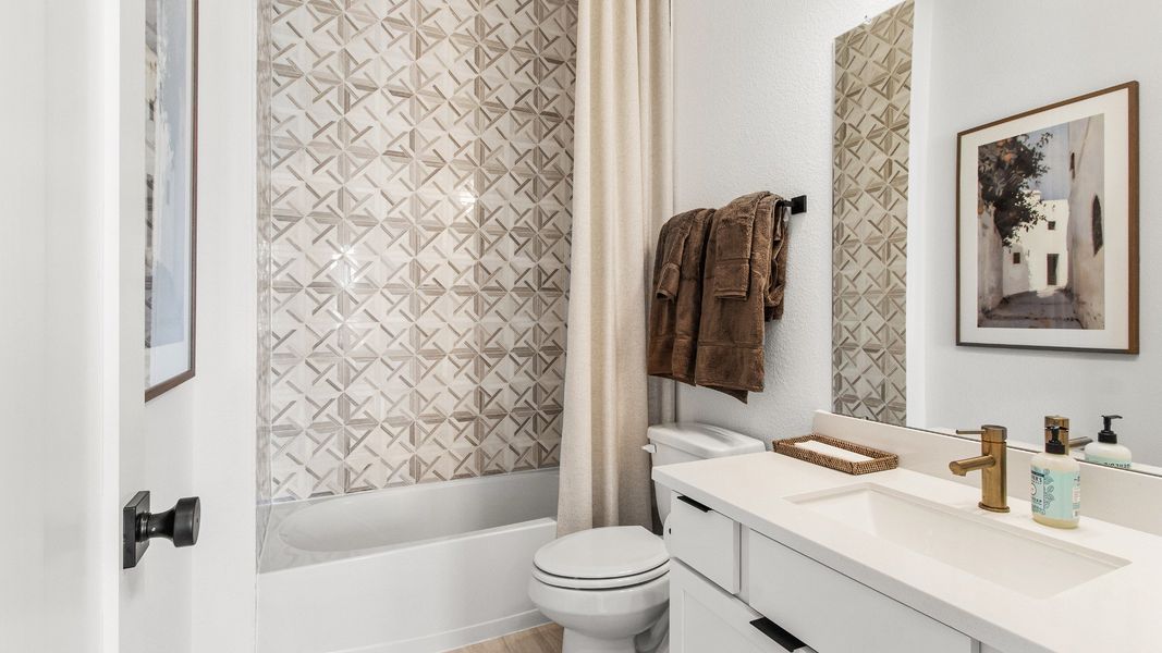 Representative furnished interior of a home built from the Tivoli by Brightland Homes in Bridgeland Central, Cypress (Image 13).