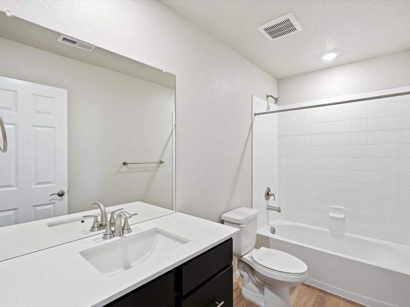 Furnished interior view inside a new home in Three Hills, Morrison (Image 7).