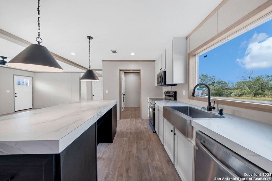 Furnished interior view inside a new home in , Moore (Image 6).