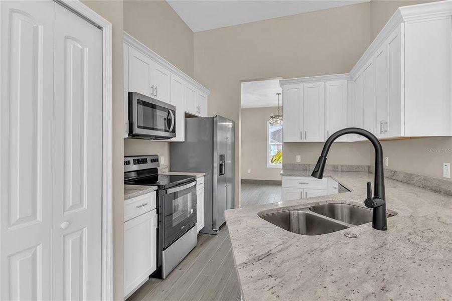 Furnished interior view inside a new home in , Kissimmee (Image 5).