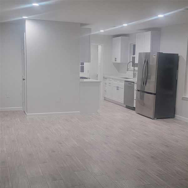 LIVING KITCHEN DINING VIEW - MODEL HOME 114