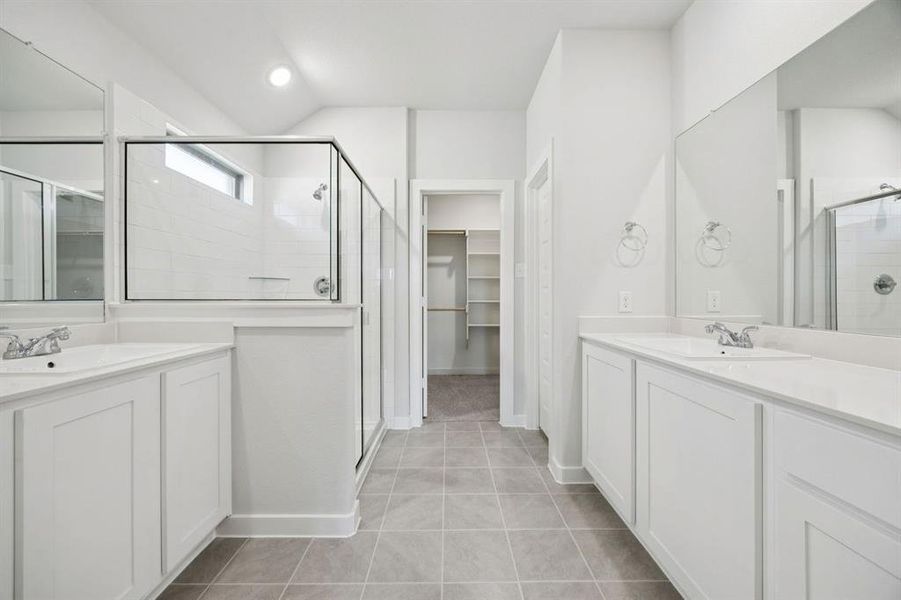 Primary Bathroom in the Heisman home plan by Trophy Signature Homes – REPRESENTATIVE PHOTO Primary Bathroom in the Heisman home plan by Trophy Signature Homes – REPRESENTATIVE PHOTO