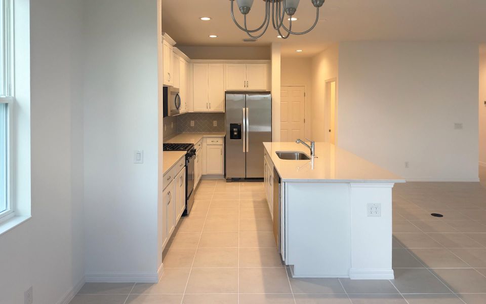 Furnished interior view inside a new home in Eagletail Landings, Howey-in-the-Hills (Image 5).