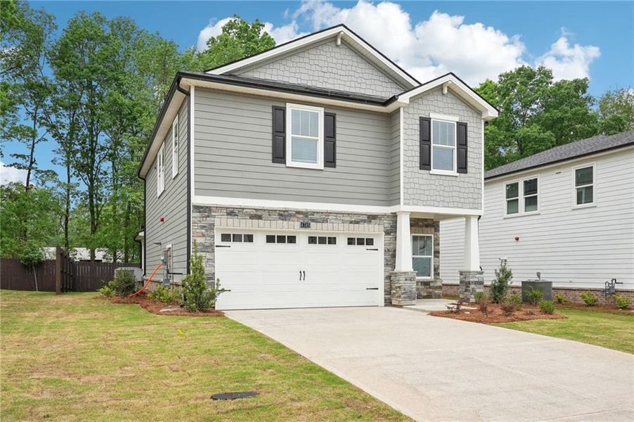 Front exterior of a new home in Hemingway - Reserve Series, Cumming, GA, highlighting curb appeal (Image 27).