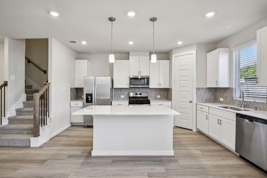 Photo is not of the actual home, but is an inspirational photo of builder’s model home and may depict options, furnishings, and/or decorator features that are not included