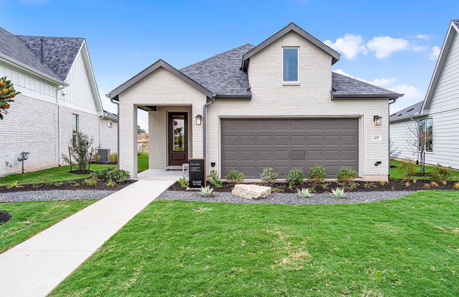 Representative exterior photo of a completed home built from the Hallmark by Del Webb in Del Webb Austin at Lost Pines, Bastrop, TX (Image 41).