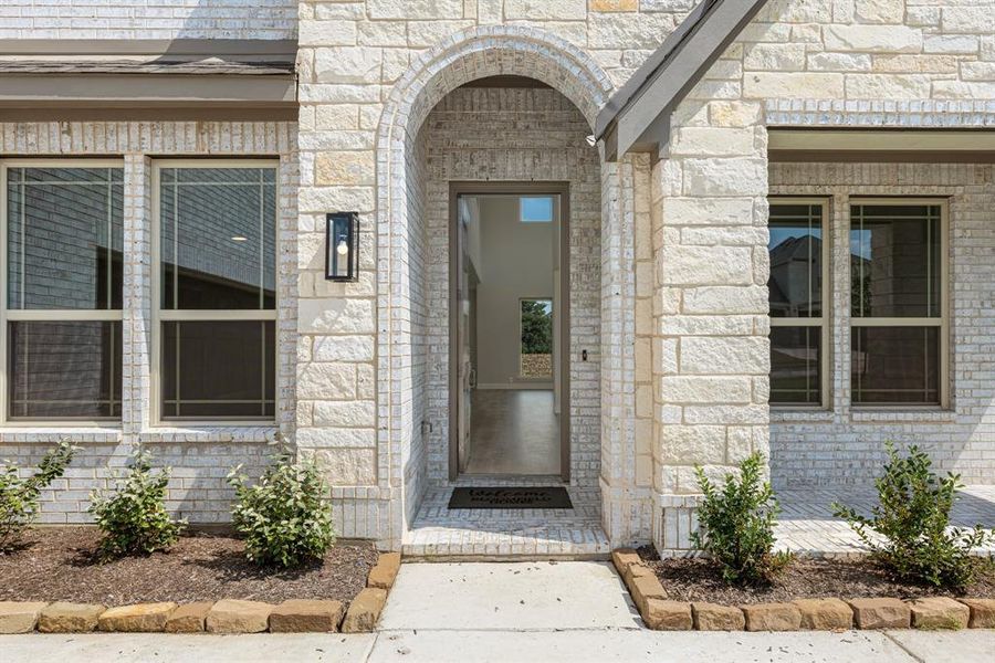 Front exterior of a new home in Trees Farm, DeSoto, TX, highlighting curb appeal (Image 25). Front exterior of a new home in Trees Farm, DeSoto, TX, highlighting curb appeal (Image 25).