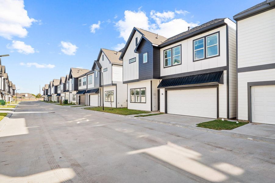 Front exterior of a new home in Metro Village, Houston, TX, highlighting curb appeal (Image 2). Front exterior of a new home in Metro Village, Houston, TX, highlighting curb appeal (Image 2).