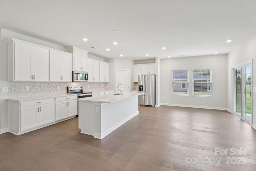 Photo is not of the actual home, but is an inspirational photo of builder’s model home and may depict options, furnishings, and/or decorator features that are not included