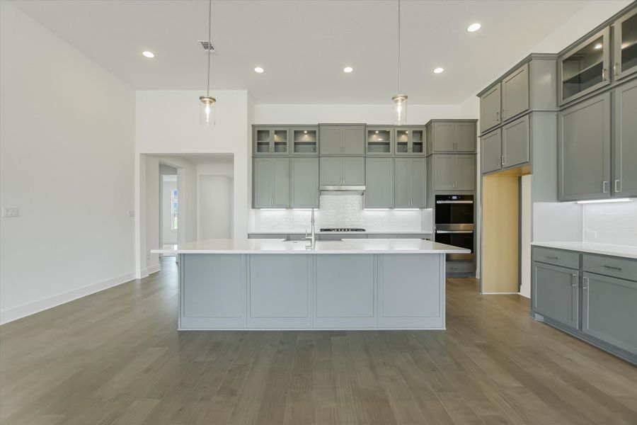 Representative furnished interior of a home built from the Vanderpool II by Giddens Homes in Whispering Wind, Bertram (Image 43).