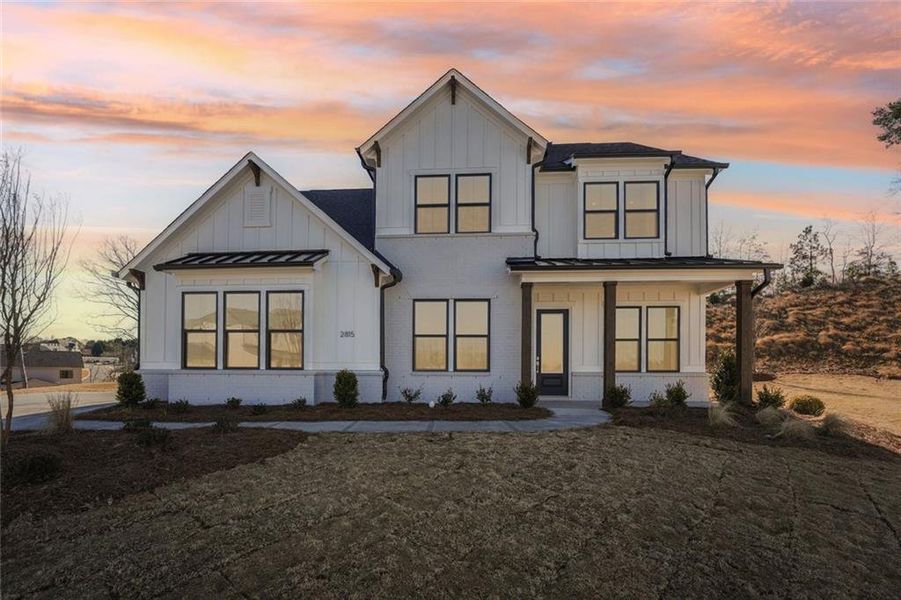 Front exterior of a new home in Sterling Pointe, Cumming, GA, highlighting curb appeal (Image 26).
