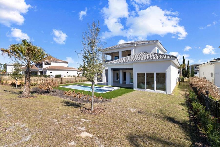 Exterior details and patio area of a home in Bella Collina, Montverde (Image 23).