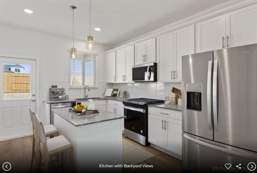 Photo of Pulte model home with same floor plan, not of actual home listed. Photo of Pulte model home with same floor plan, not of actual home listed.