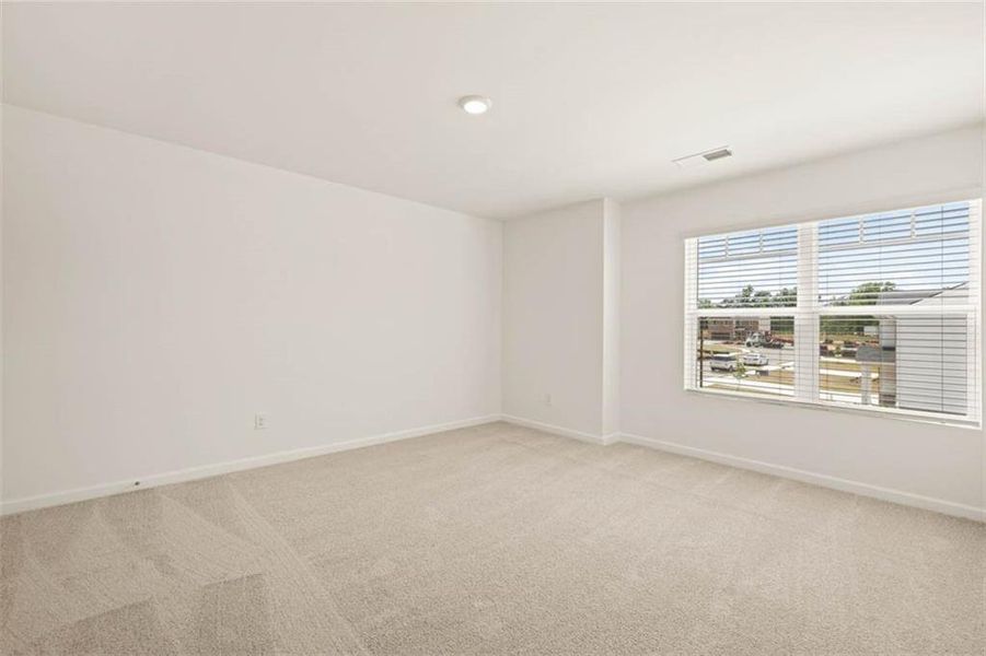 Spacious, unfurnished interior of a new home in The Reserve at Calcutta, Stockbridge (Image 12).