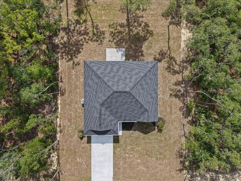 Front exterior of a new home in , Citrus Springs, FL, highlighting curb appeal (Image 27).